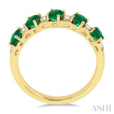 4x3 MM Oval Shape Emerald and 1/6 Ctw Round Cut Diamond Precious Band in 14K Yellow Gold