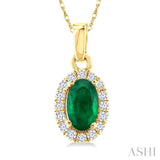 5x3 MM Oval Shape Emerald and 1/20 Ctw Single Cut Diamond Halo Precious Pendant with Chain in 14K Yellow Gold