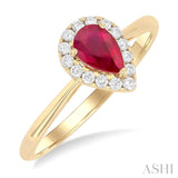 6x4 MM Pear Shape Ruby and 1/6 Ctw Round Cut Diamond Halo Precious Ring in 14K Yellow Gold