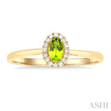5x3 MM Oval Shape Peridot and 1/20 Ctw Single Cut Diamond Halo Semi-Precious Ring in 14K Yellow Gold