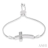 SILVER CROSS LARIAT DIAMOND BRACELET